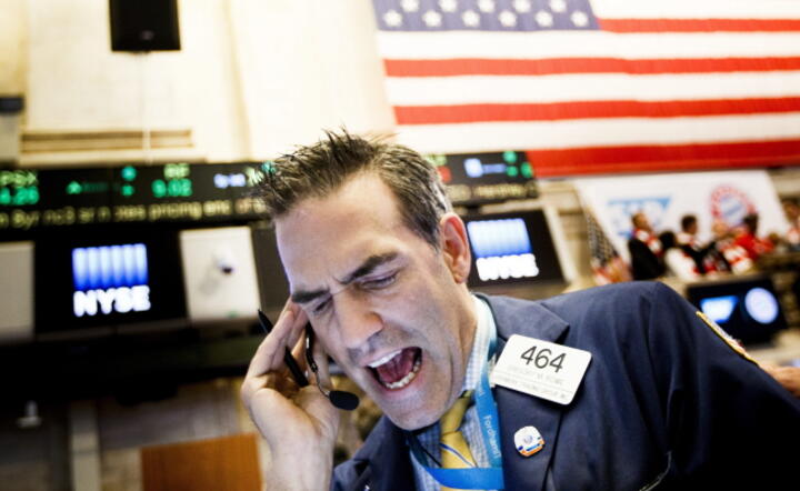 Makler na parkiecie NYSE, fot. PAP/EPA/JUSTIN LANE
