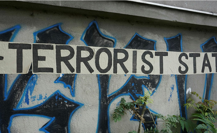 Rosja panstwo terrorystyczne, graffiti w Warszawie. / autor: Fratria