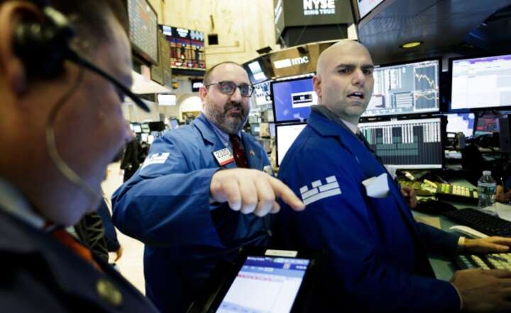 Makler na parkiecie NYSE, fot. PAP/EPA/JUSTIN LANE