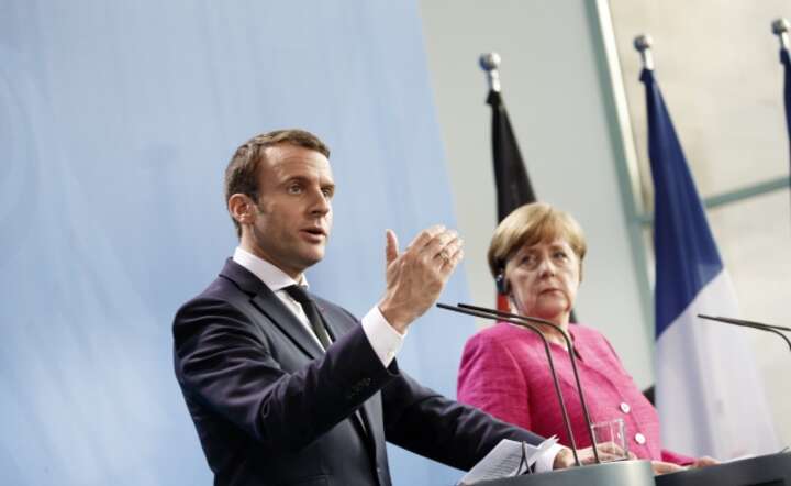 Prezydent Emmanule Macron i kanclerz Angela Merkel na wspólnej konferencji prasoej, fot. PAP/EPA/CARSTEN KOALL