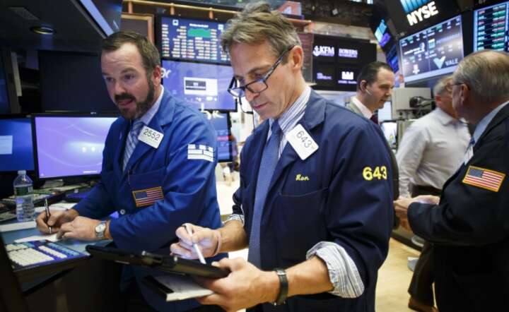 Maklerzy na Wall Street, fot. PAP/EPA/Justin Lane