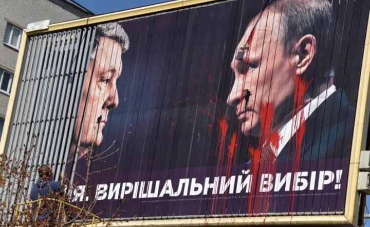 Plakat w Lwowie / autor: PAP/EPA/PAVLO PALAMARCHUK