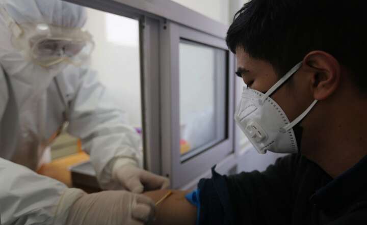 Koronawirus w Chinach / autor: PAP/EPA/WANG YANBING