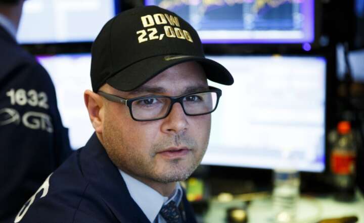 Makler na parkiecie NYSE, fot. PAP/EPA/JUSTIN LANE