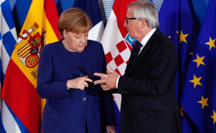 Kanclerz Niemiec Angela Merkel i szef KE Jean-Claude Juncker / autor: fot. PAP EPA/YVES HERMAN