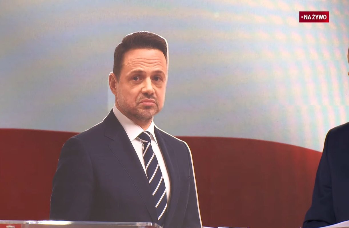 Cardboard Trzaskowski at the debate. He opposed... Braun