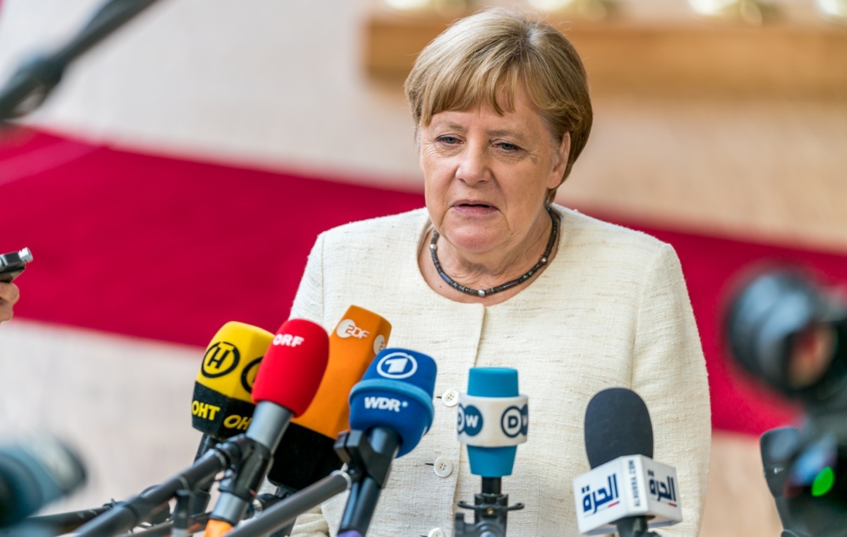 Merkel spotkała się z imigrantami w syryjskiej restauracji