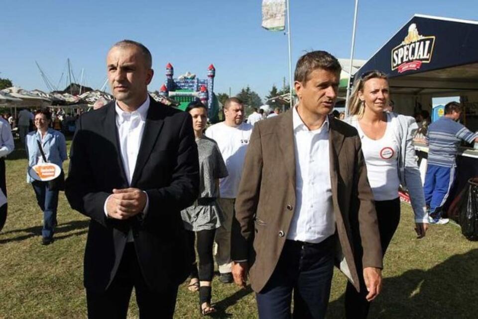 Wojciech Penkalski i Janusz Palikot w czasie kampanii wyborczej. Fot. PAP / Adrian Starus