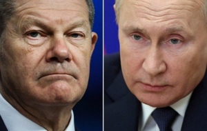 kanclerz Niemiec Olaf Scholz i prezydent Rosji Władimir Putin / autor: Tom Nuttall