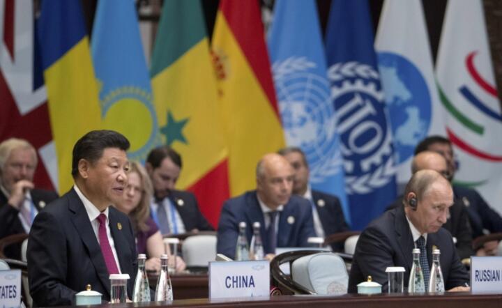 Hangzhou (Chiny): Prezydent Chin Xi Jinping otwiera szczyt G20, obok prezydent Rosji Władimir Putin, fot. PAP/ EPA/MARK SCHIEFELBEIN