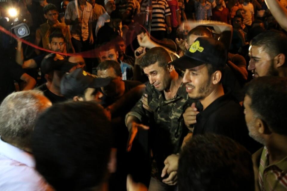 Przywitanie więźniów zwolnionych przez Izrael, Fot. PAP/EPA