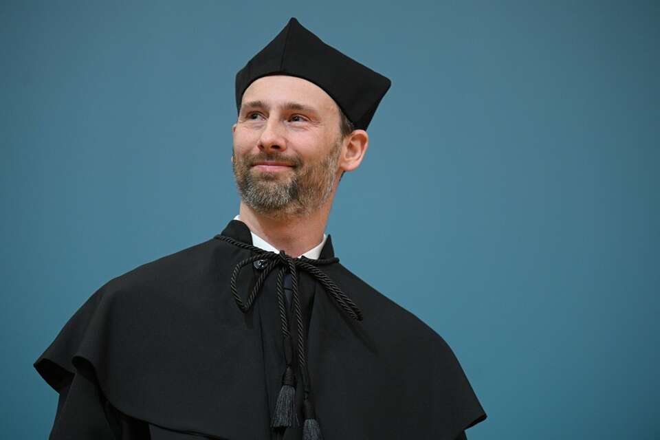 Astronauta Europejskiej Agencji Kosmicznej Sławosz Uznański-Wiśniewski odbiera tytuł doktora honoris causa SGH / autor: PAP/Marcin Obara