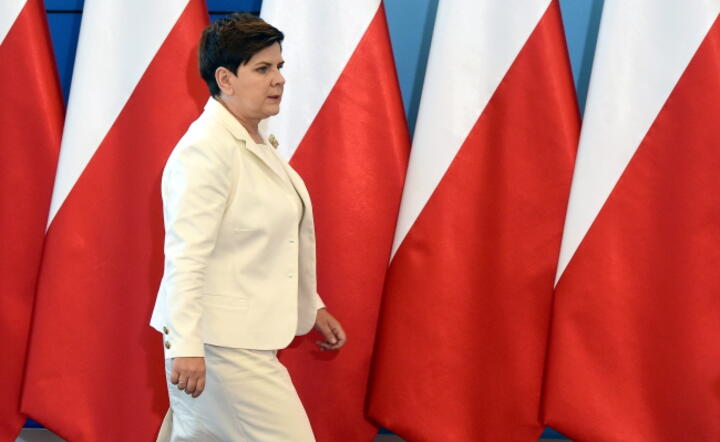 Premier Beata Szydło po posiedzeniu rządu, na którym przyjęto projekt budżetu 2017 r., fot. PAP/Radek Pietruszka