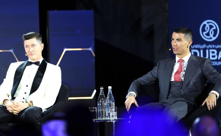 Robert Lewandowski i Cristiano Ronaldo / autor: PAP/EPA/ALI HAIDER