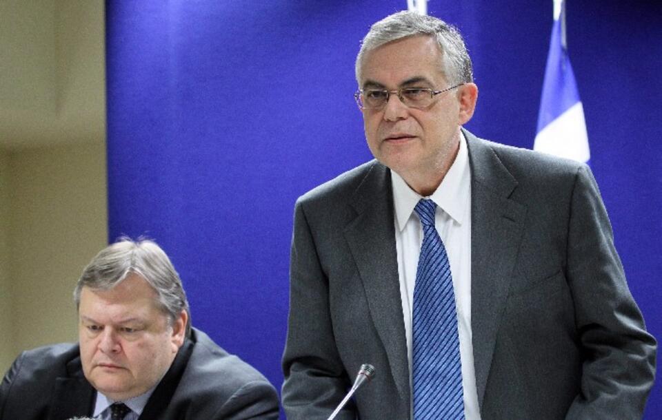 Grecki minister finansów Ewangelos Wenizelos i premier Lucas Papademos po zakończeniu rozmów, PAP/EPA