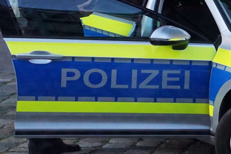 Na zdjęciu drzwi samochodu niemieckiej policji / autor: Fratria