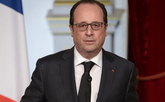 Hollande broni Merkel przed krytyką w sprawie imigrantów