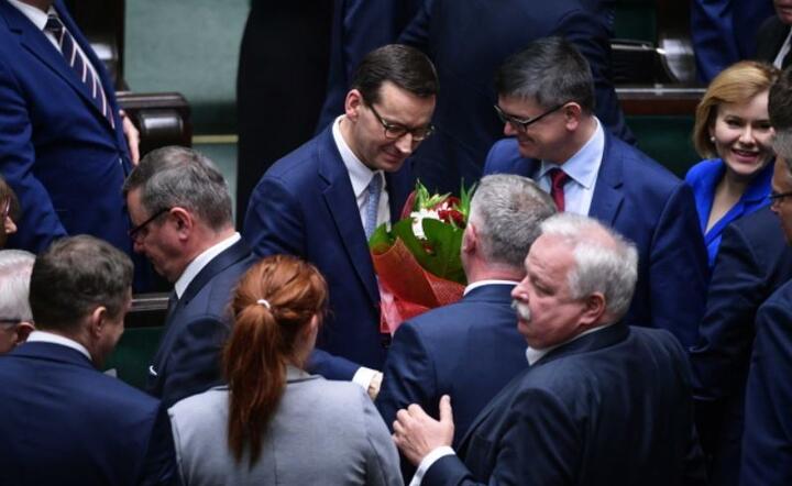 Premier odbiera gratulacje po głosowaniu w Sejmie  / autor: PAP