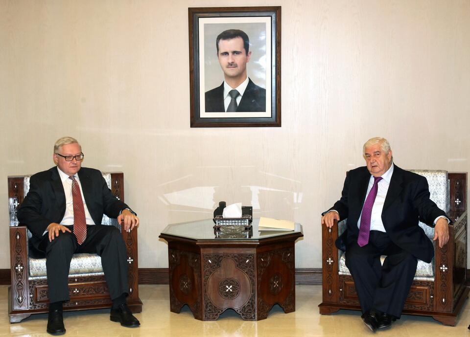 Syryjski minister spraw zagranicznych Walid al-Moallem (z prawej) podczas spotkania z wiceszefem rosyjskiego MSZ Siergiejem Riabkowem w Damaszku, PAP/EPA