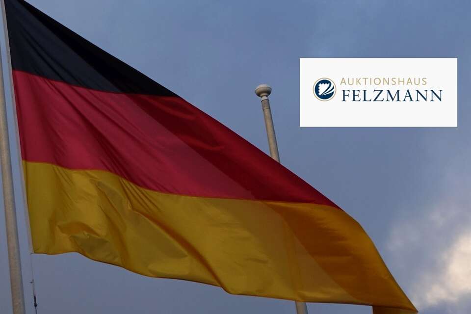 Logo Domu Aukcyjnego Felzmann na tle niemieckiej flagi / autor: Fratria/felzmann.de