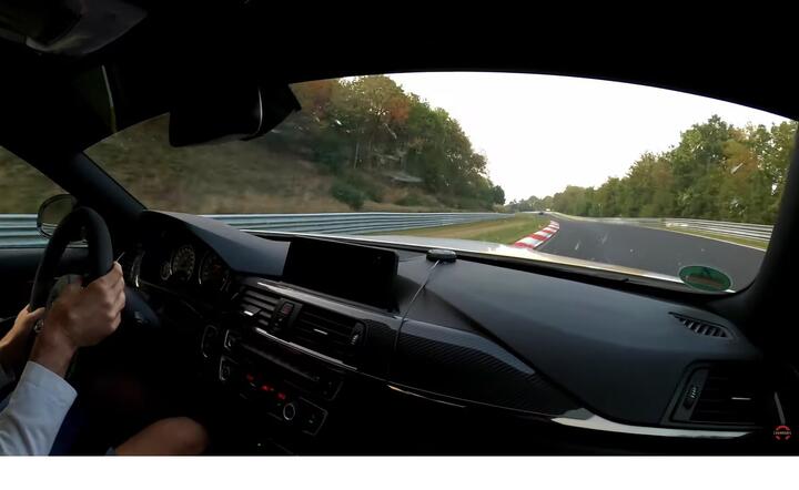 Kierowca F1 Robert Kubica w BMW M4 na torze Nürburgring! / autor: screen z materiału Micha Charoudin, YouTube