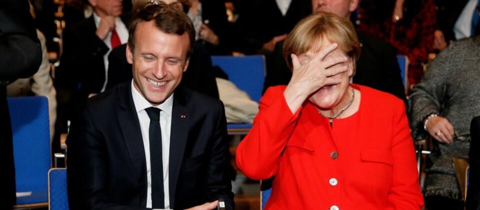 Angela Merkel, Emmanuel Macron / autor: 	PAP/EPA/RONALD WITTEK