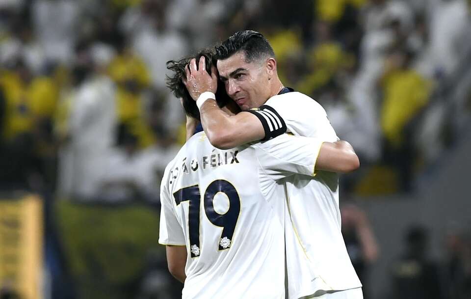 Cristiano Ronaldo i Joao Felix / autor: PAP/EPA