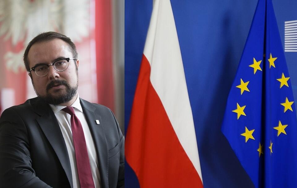 Wiceszef MSZ Paweł Jabłoński/Flagi Polski i UE / autor: Fratria