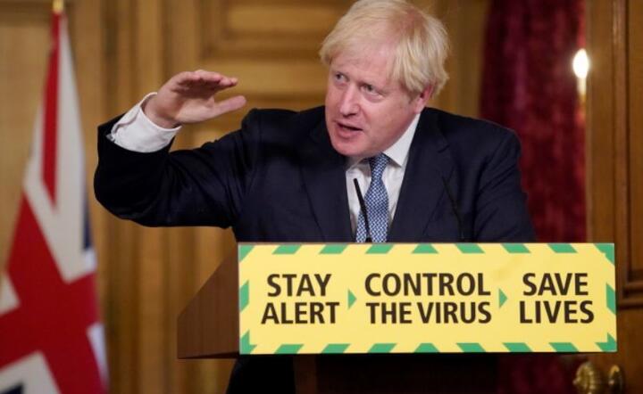 Boris Johnson podczas cyfrowej konferencji prasowej Covid-19 na n10 Downing Street w Londynie, 31 bm / autor: PAP/EPA